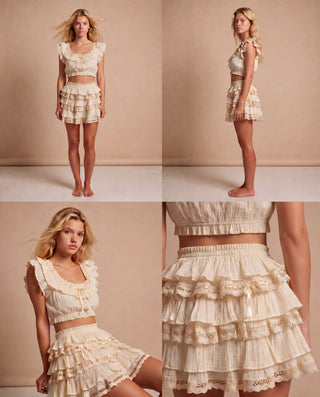 A four-panel collage showing a model wearing a cream-colored two-piece outfit. The set includes a ruffled crop top and a tiered ruffle mini skirt with lace trim, shown from front, side, and close-up views against a solid beige studio backdrop.